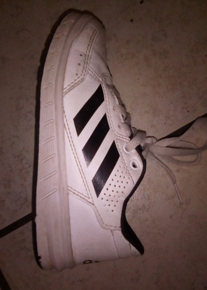 Adidas girls size 11.  White with black stripes.